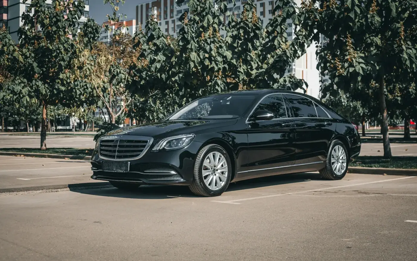 Black Mercedes luxury sedan representing professional black car service