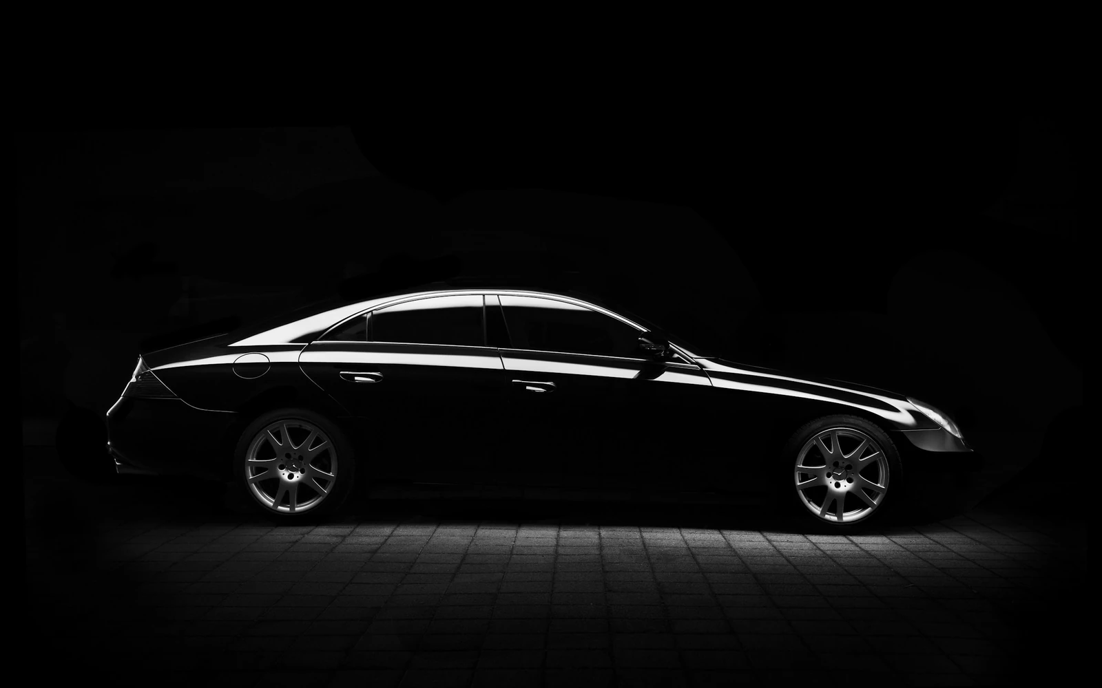 Black luxury sedan reserved in advance for airport limo service