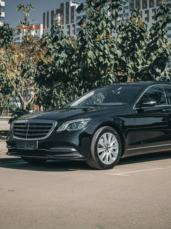 Black Mercedes sedan for corporate chauffeur service